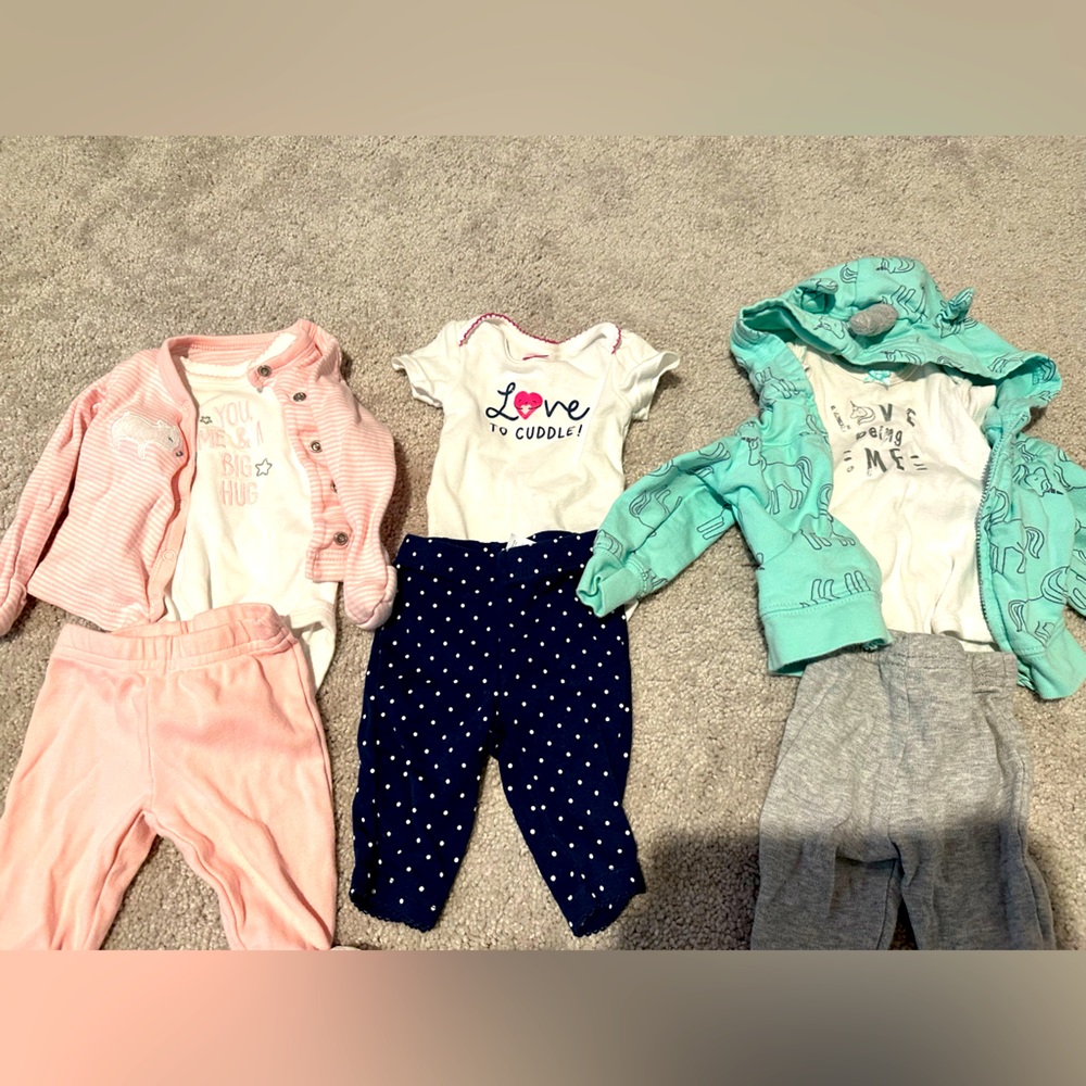 Three newborn outfits